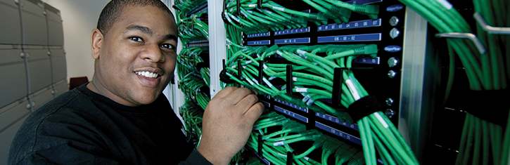 student at server rack